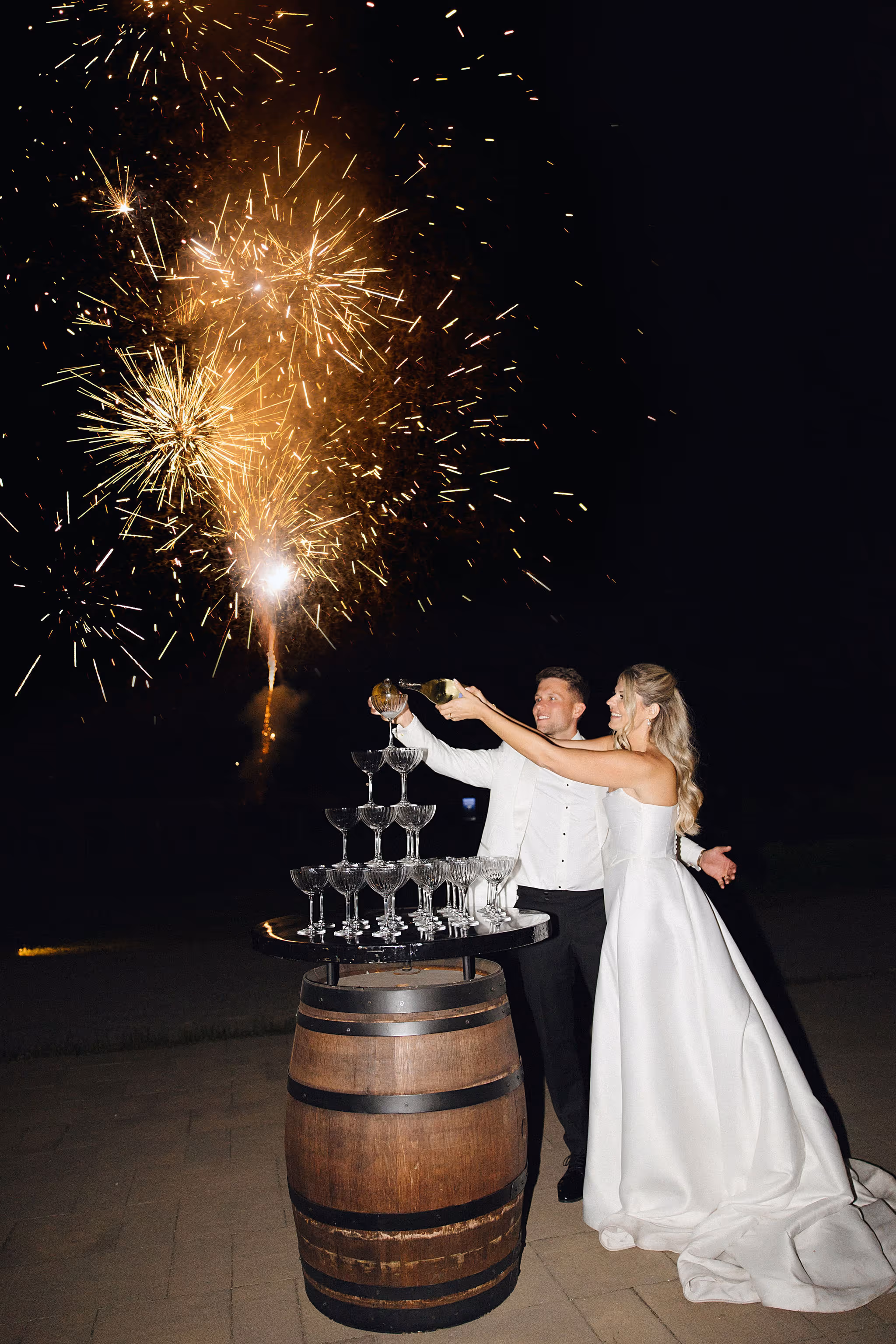 pooring champagne during wedding reception at Chateau des Charmes winery in Niagara-on-the-Lake