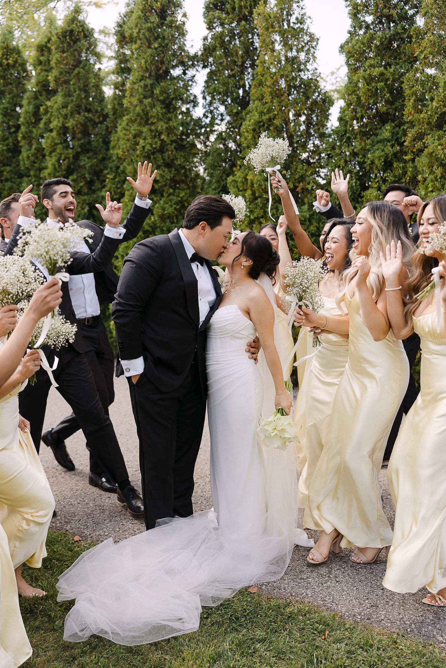 Documentary-style wedding party photo at Aga Khan