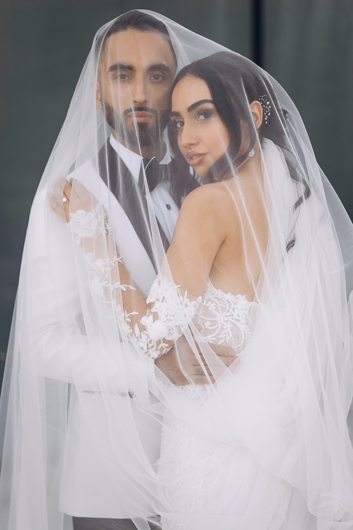 Classic under-the-veil couple portrait
