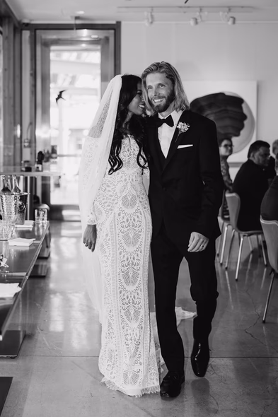 walking down the aisle at Art Gallery of Ontario (AGO) wedding