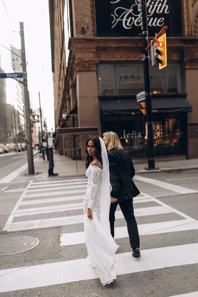 couple photo in front of Leña Restaurant 