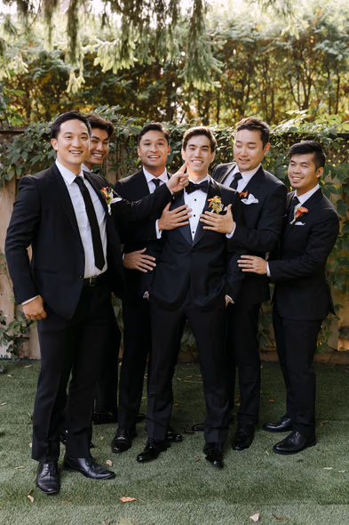 Groomsmen posing together