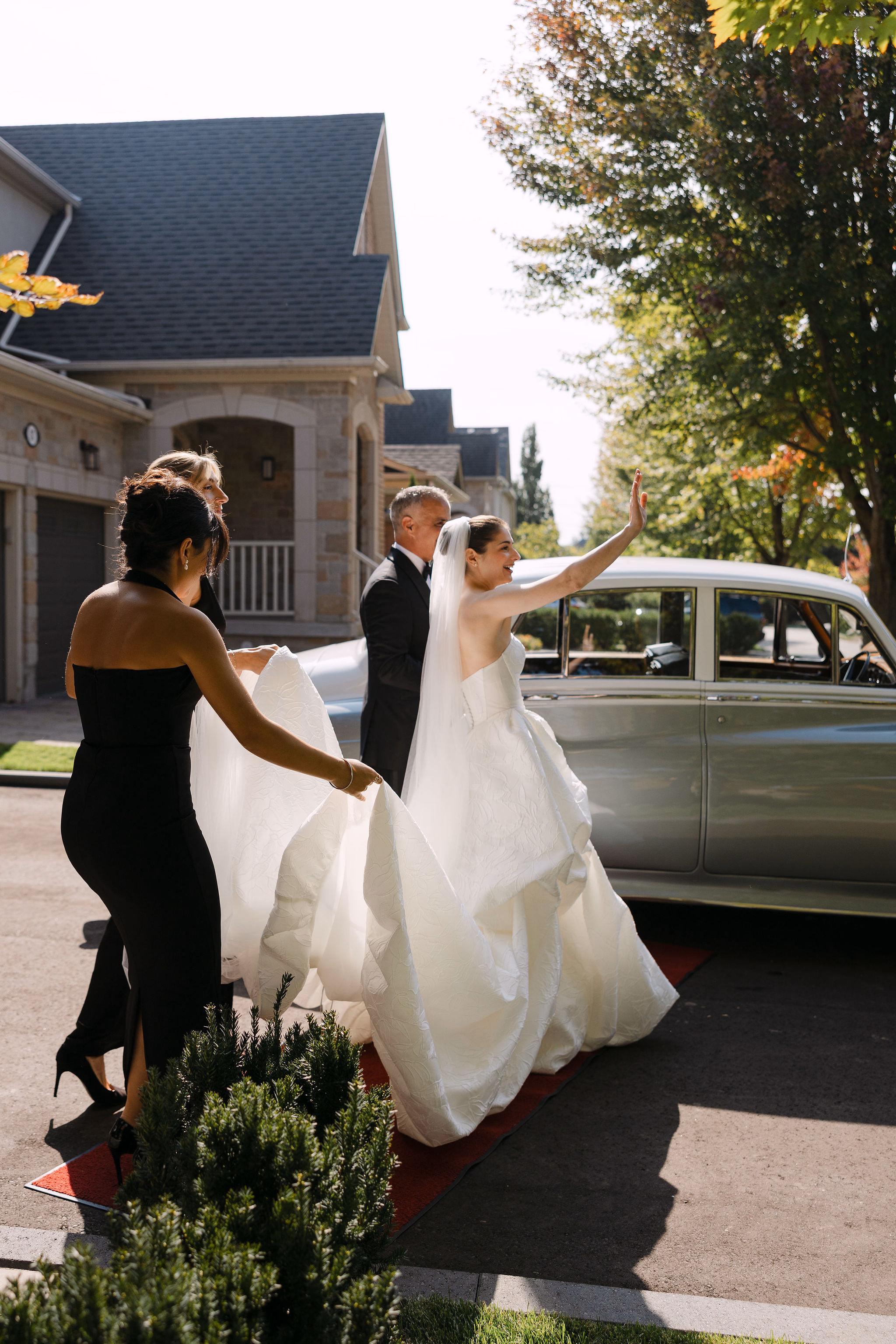 bride leaving her house for wedding ceremony