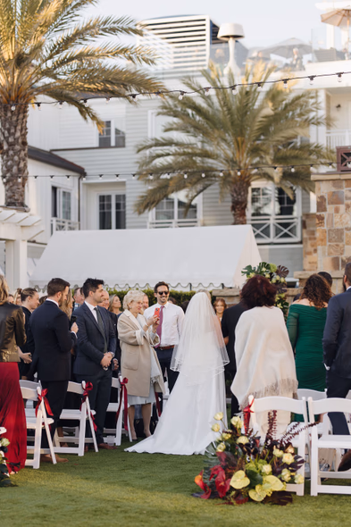 bride enters the aisle at Lido House
