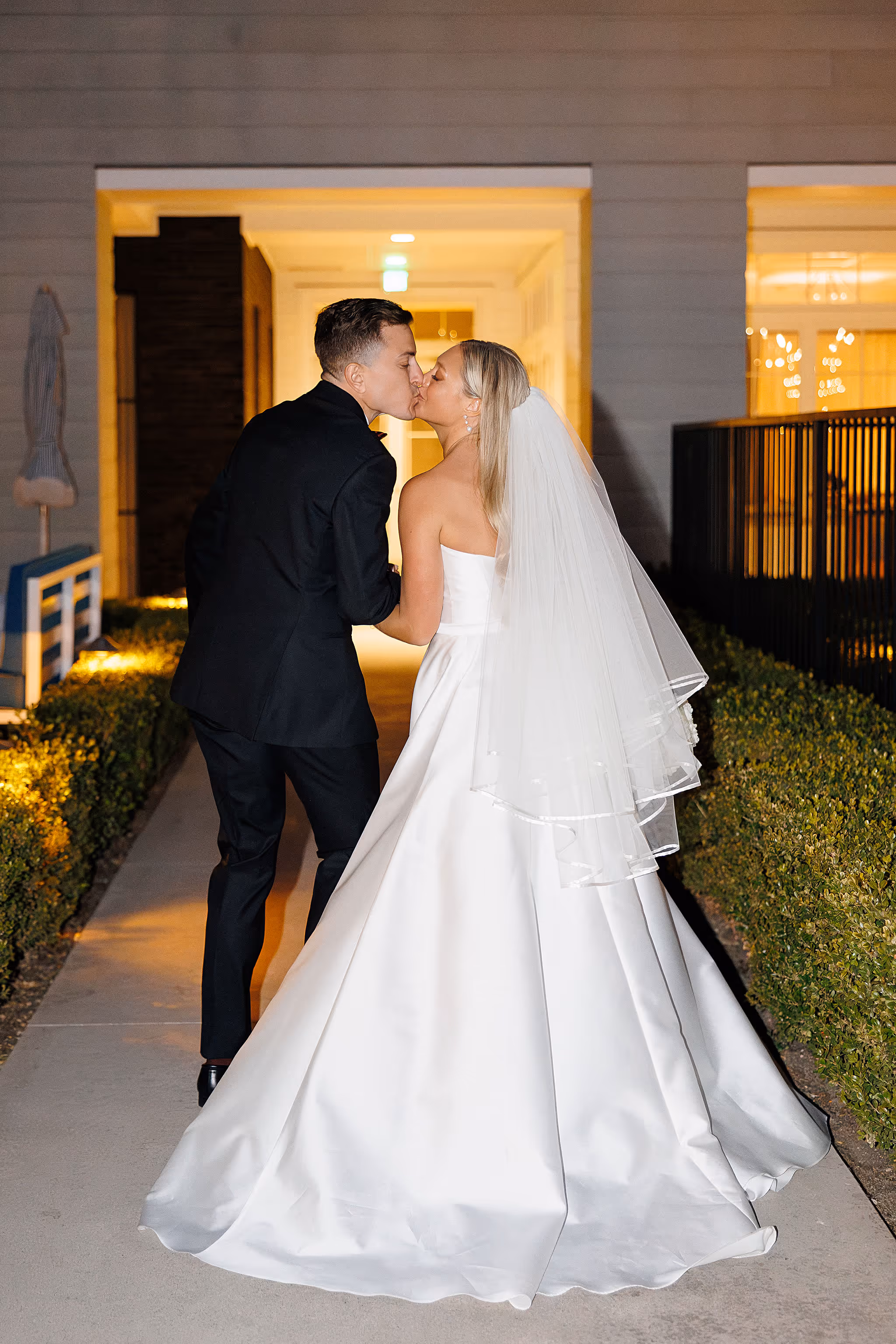 bride and groom kissing at  Lido House