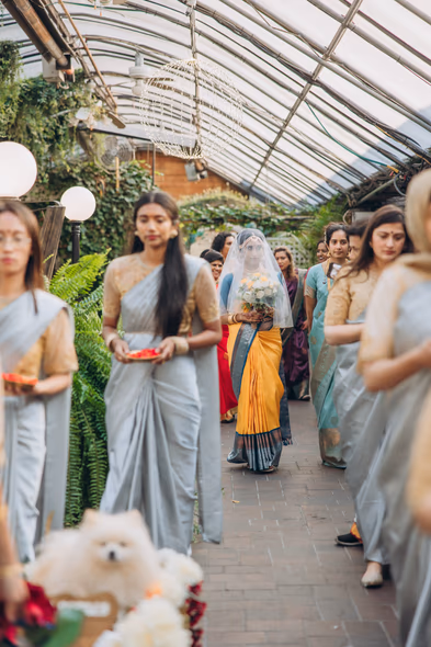 Guests arriving for Tamil Hindu wedding at greenhouse wedding venue Ontario