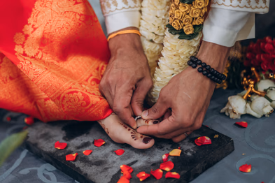 Wedding ritual with petals during Hindu Tamil wedding at Madison Greenhouse event venue