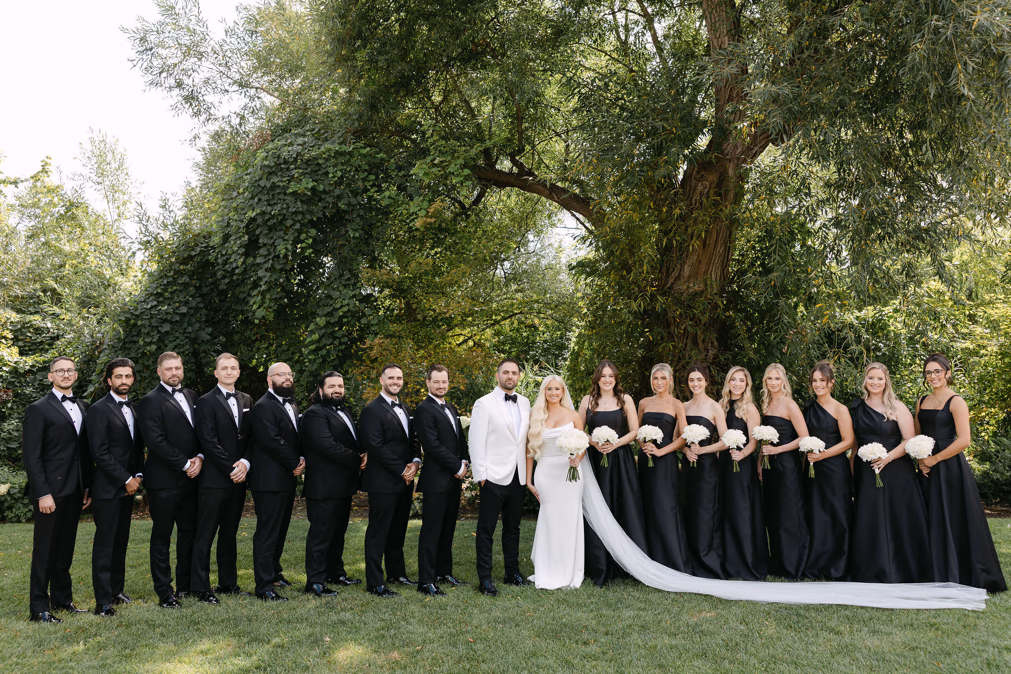 full wedding party portrait under the willow tree at The Arlington Estate Vaughan