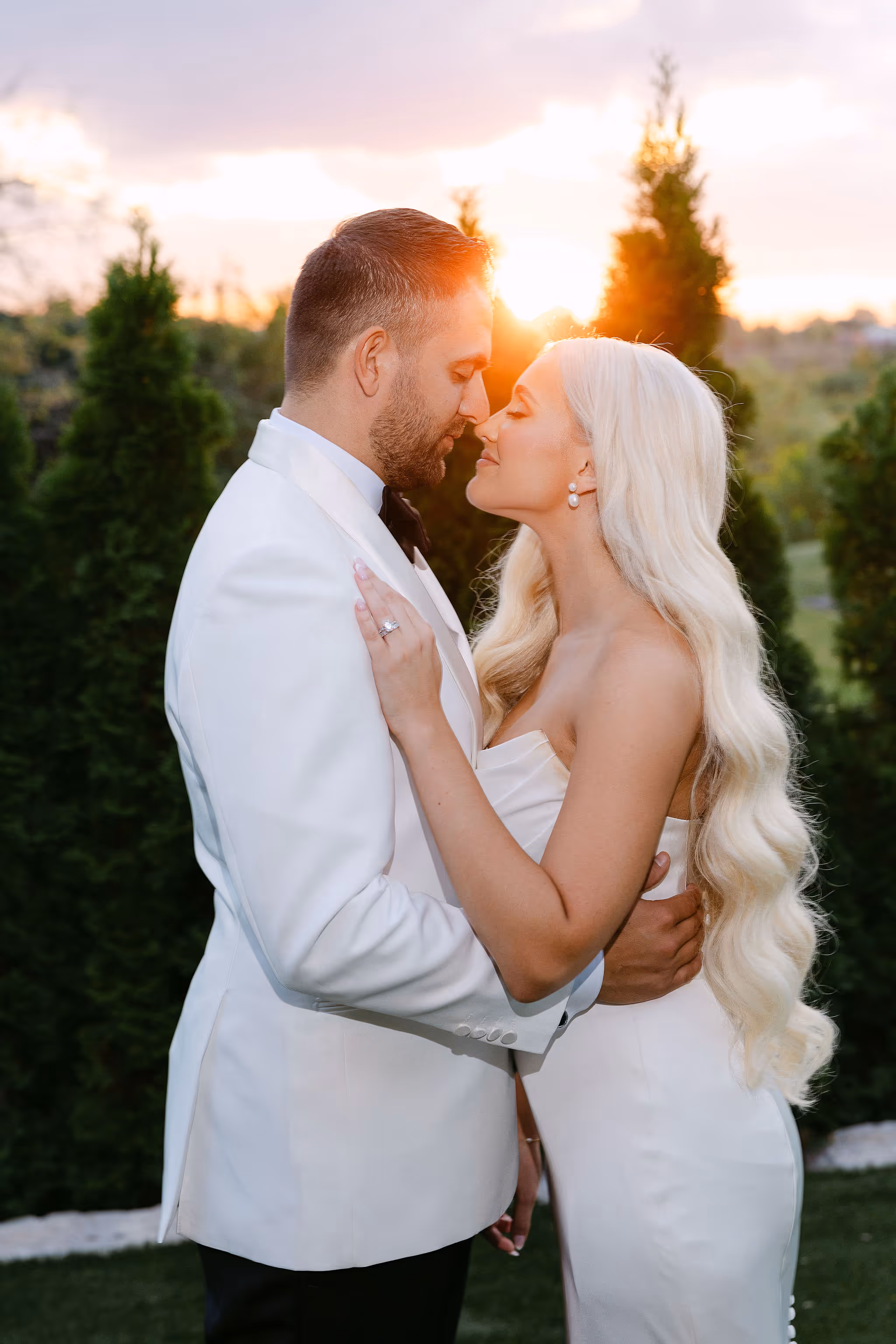 bride and groom embrace at golden hour at The Arlington Estate Vaughan — Astora Studio wedding photography