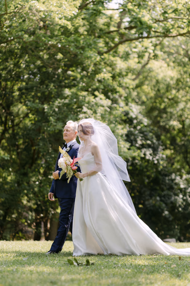 bride walking down the aisle with father outdoor ceremony Queen’s Landing Niagara wedding