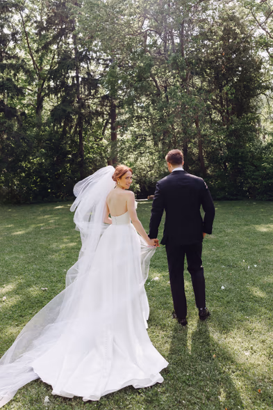 romantic dip kiss bride and groom outdoor ceremony moment Queen’s Landing wedding