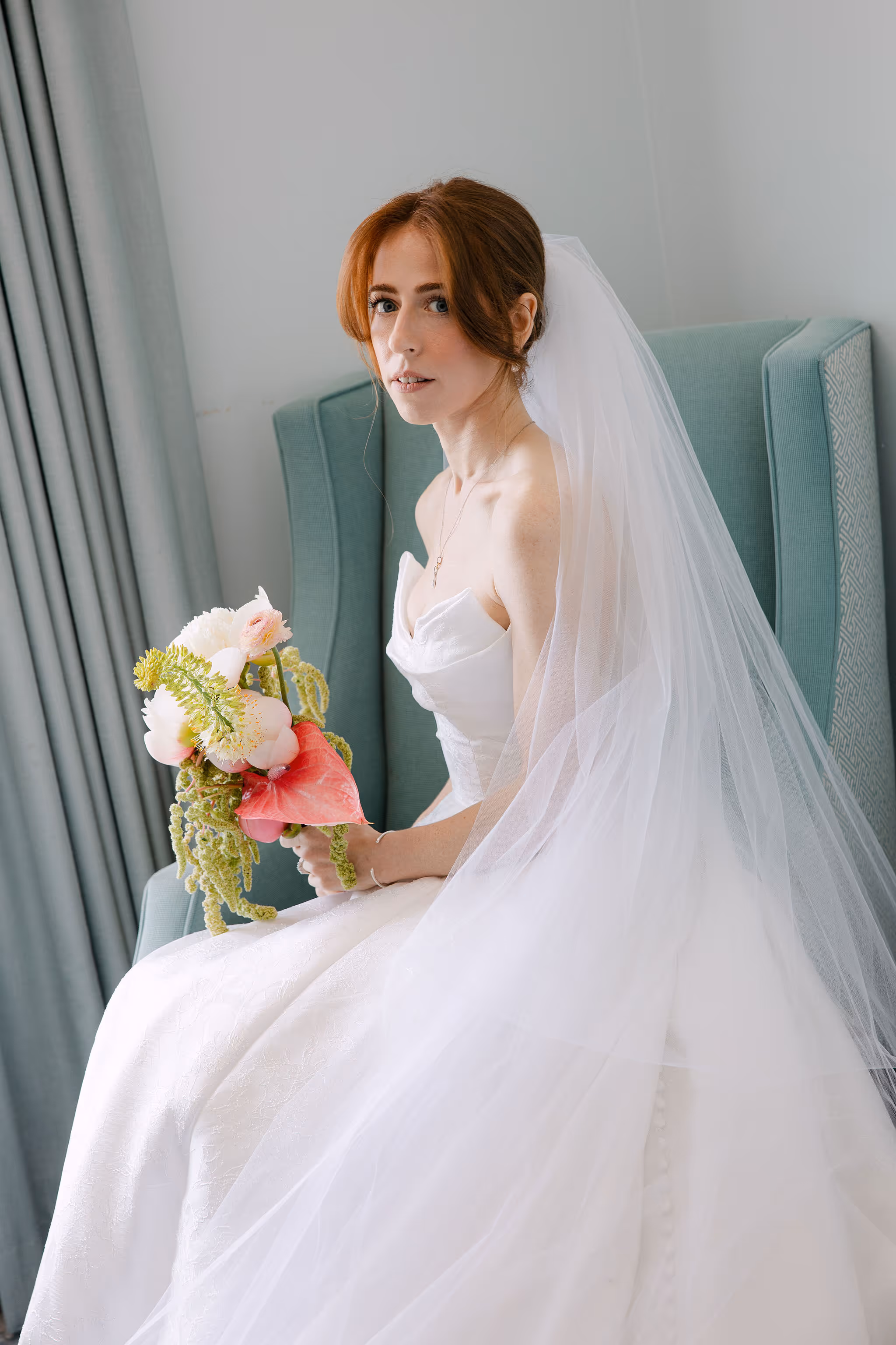 editorial portrait of the bride in the bridal suite at Queen’s Landing Hotel — Astora Studio