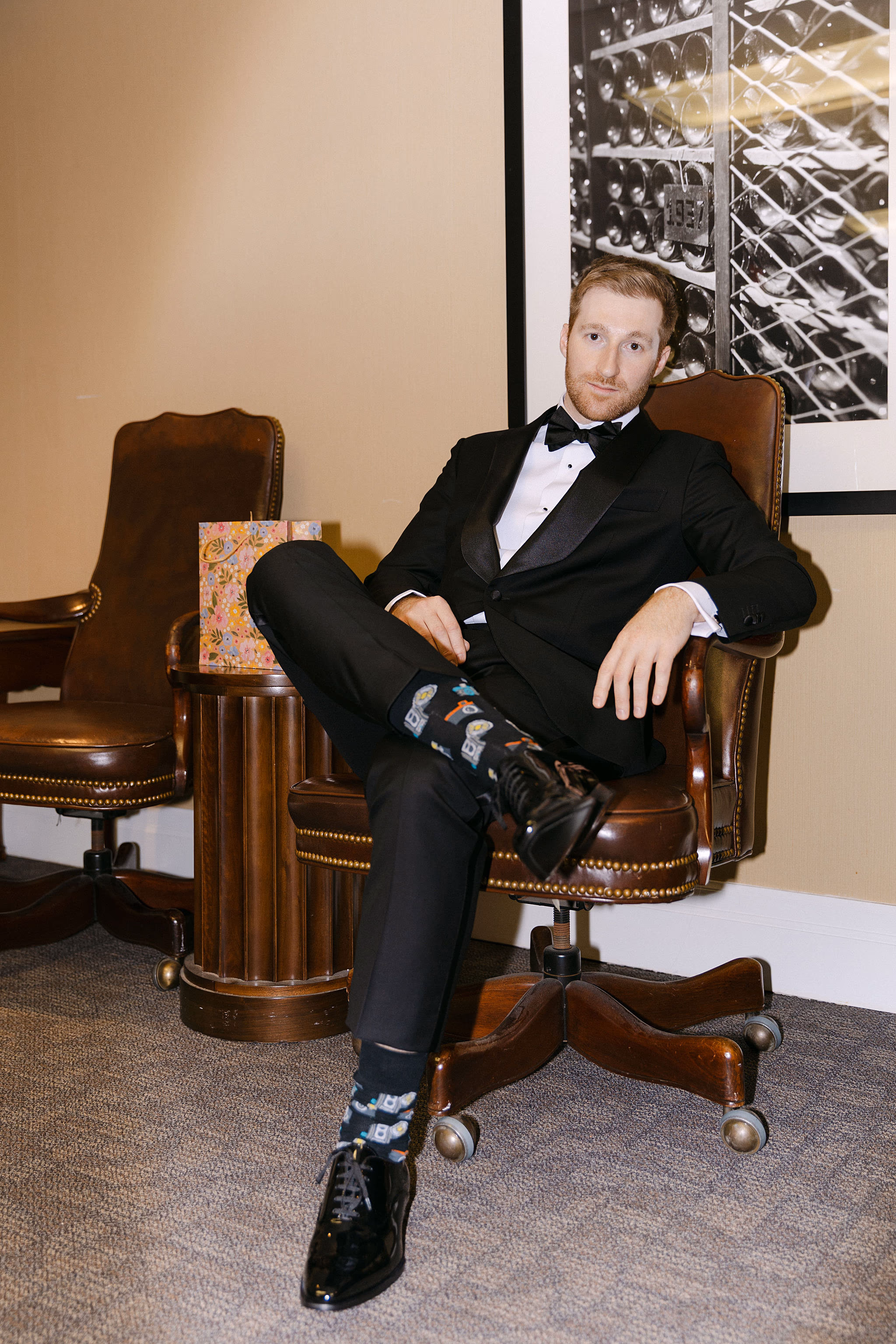 elegant portrait of the groom before the ceremony at Queen’s Landing Hotel — Astora Studio