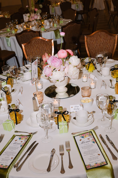elegant reception table setting floral centerpiece Imperial Ballroom Queen’s Landing wedding