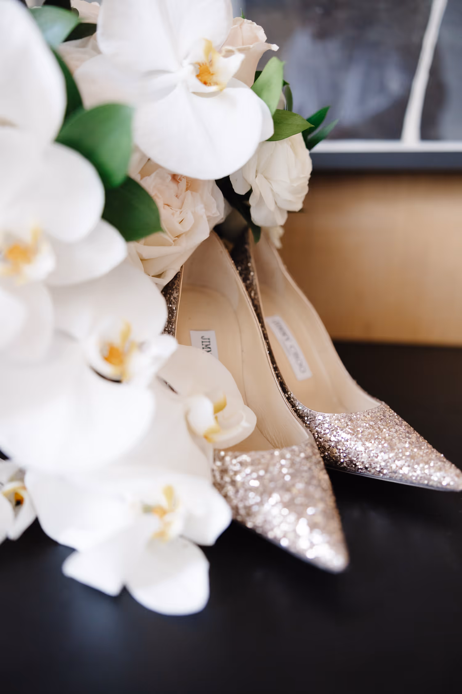 Heels and orchids flat lay