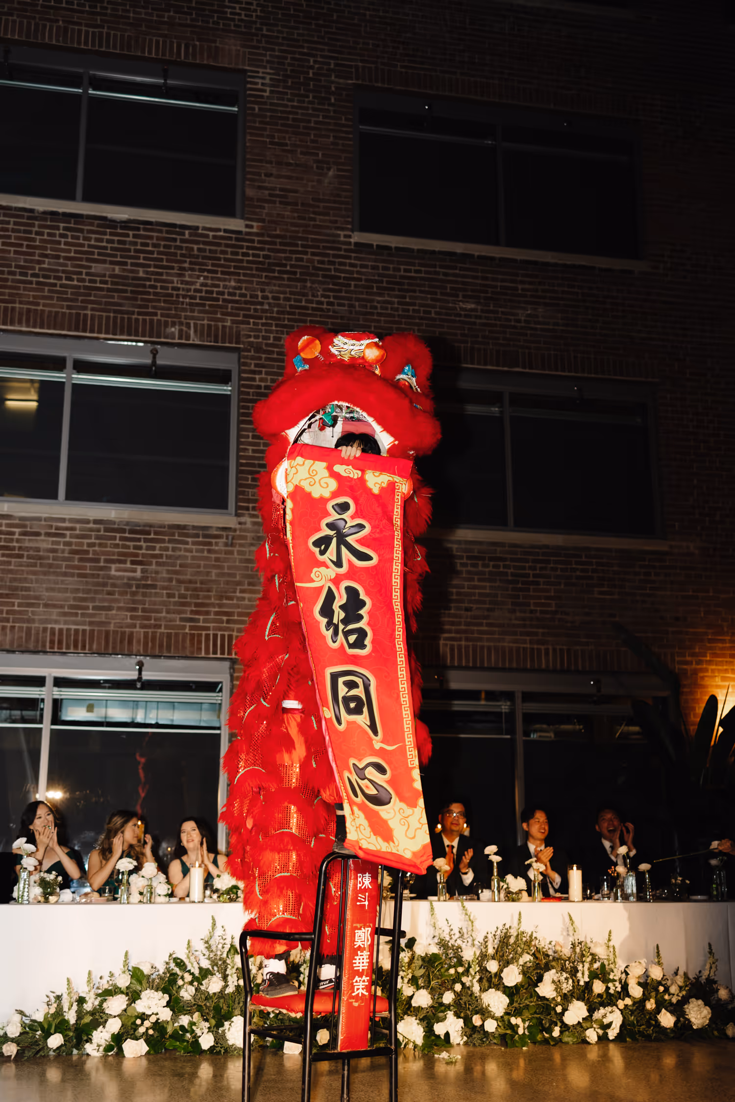 lion dancers at ricardas atrium toronto