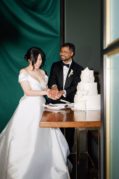 cut the cake at Canoe Restaurant wedding